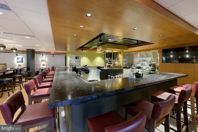 bar with a dry bar, wooden ceiling, and recessed lighting