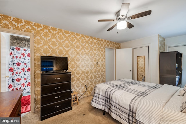 carpeted bedroom featuring ceiling fan