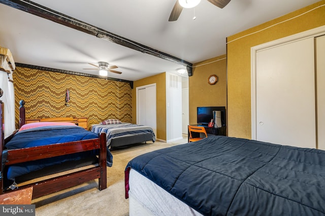 bedroom featuring light carpet and ceiling fan