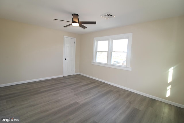 unfurnished room featuring hardwood / wood-style flooring and ceiling fan