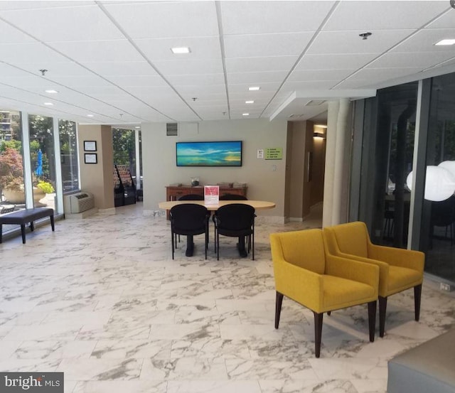 8340 Greensboro Dr Unit 1010, Mclean, VA 22102 - community lobby with expansive windows, a paneled ceiling, and recessed lighting