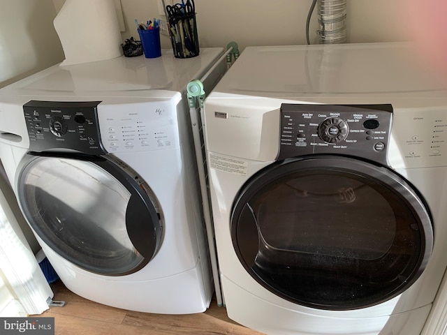 laundry room featuring independent washer and dryer