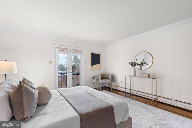 bedroom with hardwood / wood-style flooring, french doors, crown molding, and access to outside