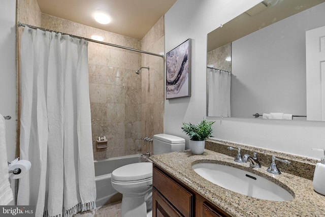 full bathroom featuring toilet, shower / tub combo with curtain, and vanity