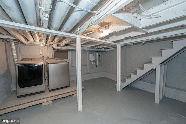 basement featuring washing machine and dryer