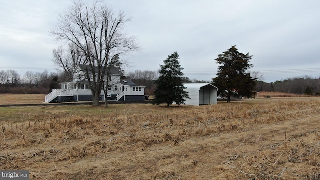 view of yard featuring a carport