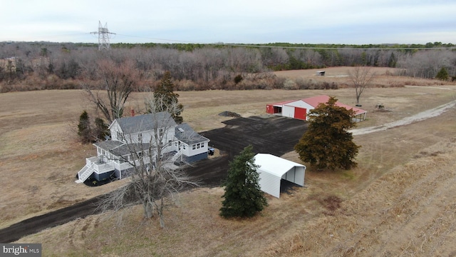 birds eye view of property featuring a rural view