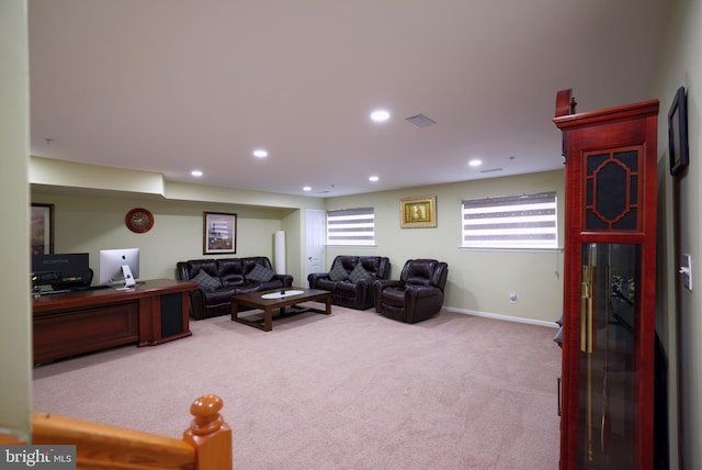 living room featuring light carpet