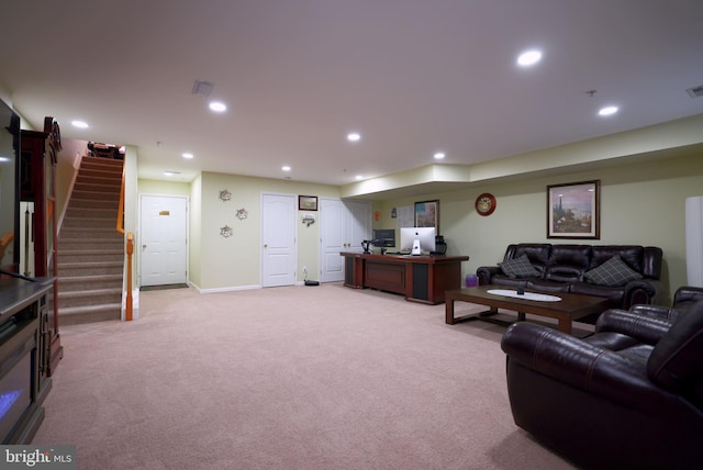 living room featuring light carpet