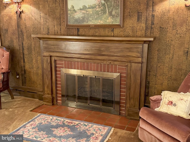 details with a brick fireplace and wood walls