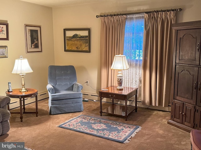 sitting room featuring carpet flooring and a baseboard radiator