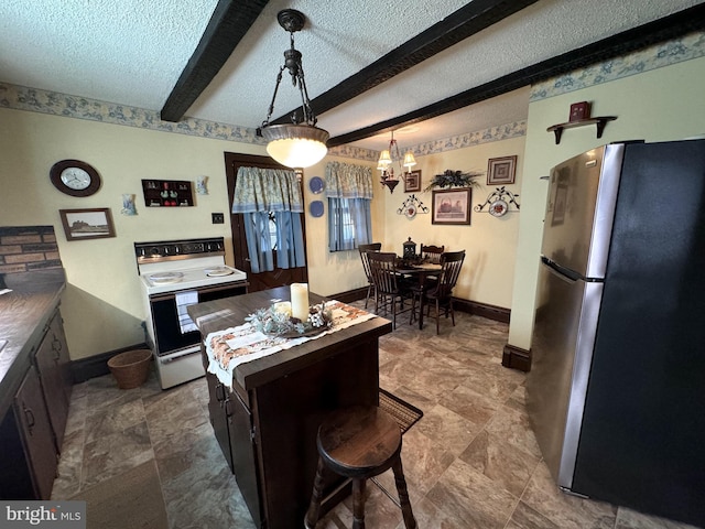 kitchen with white range with electric cooktop, decorative light fixtures, a textured ceiling, and stainless steel refrigerator