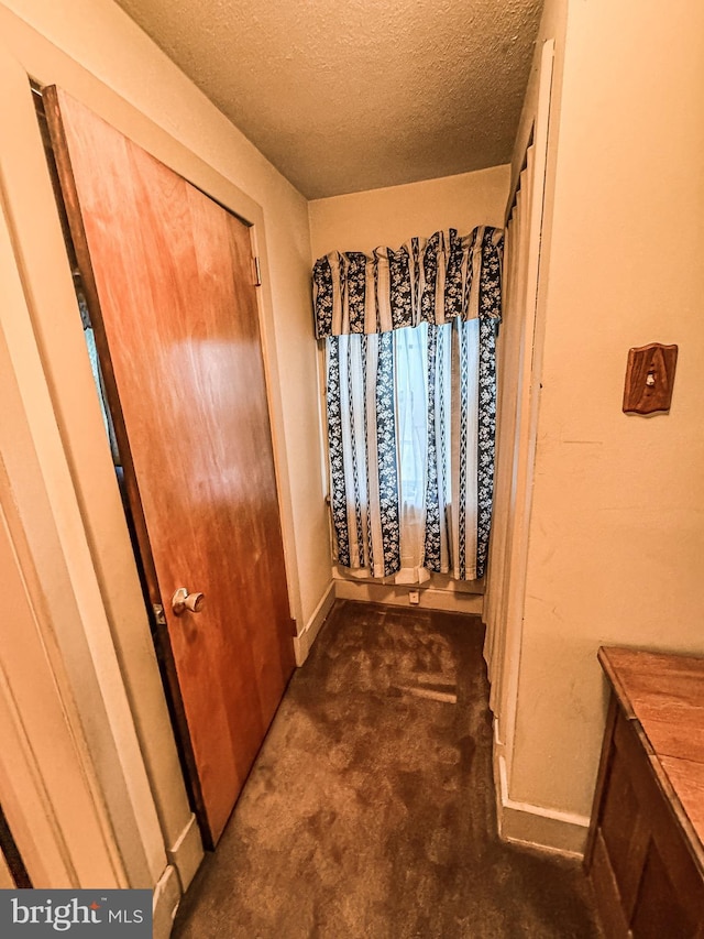 bathroom with a textured ceiling