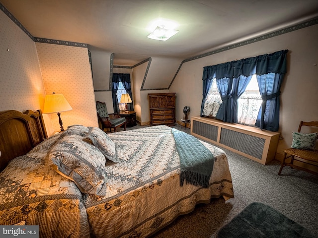 bedroom featuring carpet floors and radiator