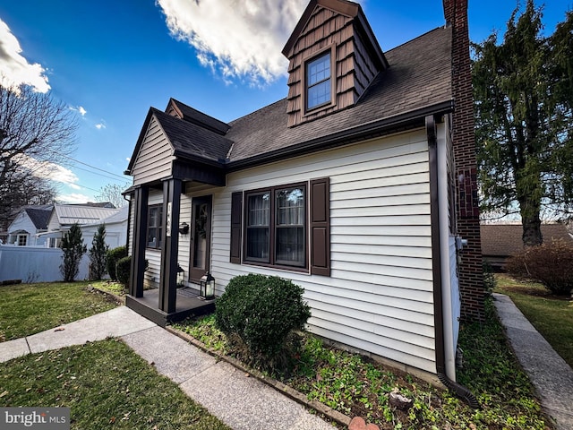 view of front of home with a front yard