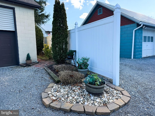 view of property exterior featuring a garage