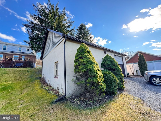 view of home's exterior with a lawn