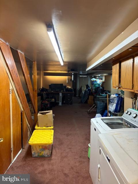 interior space with washing machine and clothes dryer