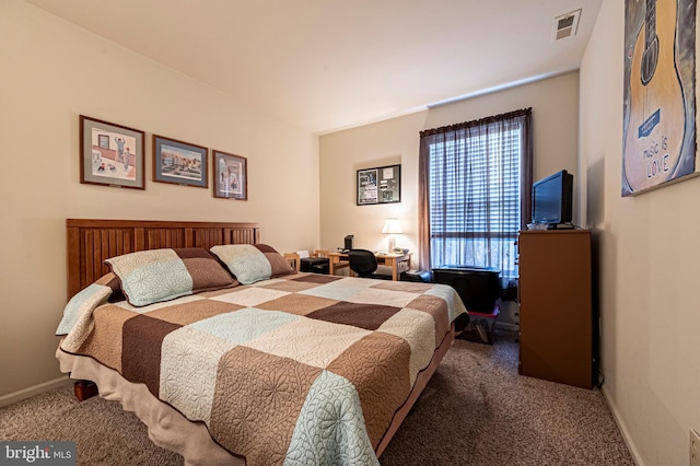 bedroom featuring carpet flooring