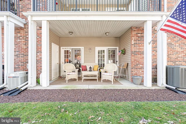 view of patio / terrace featuring a balcony and cooling unit