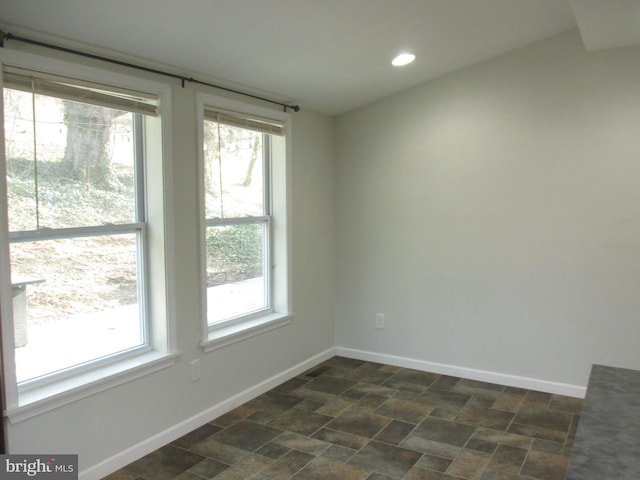 spare room with plenty of natural light