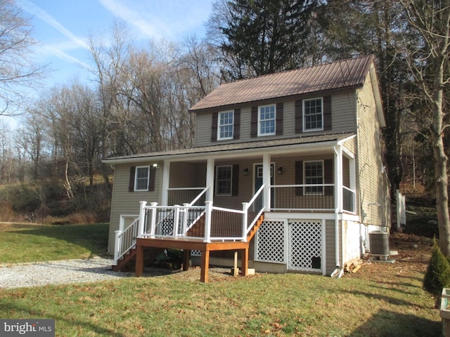 view of front of house with a front lawn and a porch