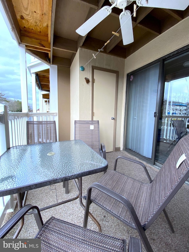 view of patio / terrace featuring a balcony and ceiling fan