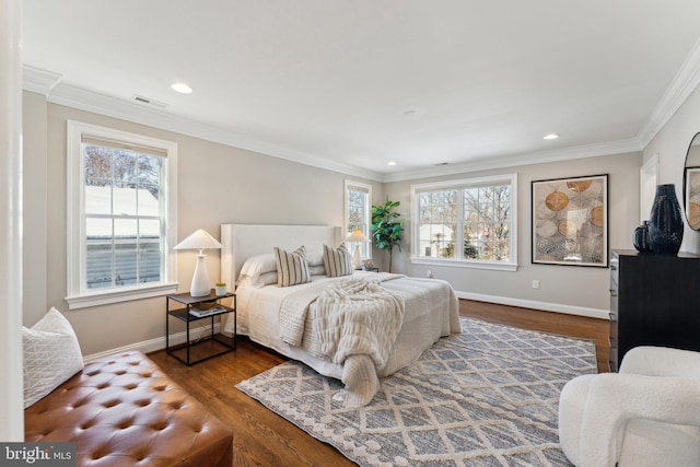 bedroom featuring dark hardwood / wood-style flooring and crown molding