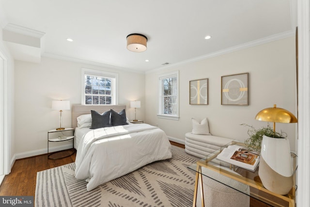 bedroom featuring wood-type flooring and ornamental molding