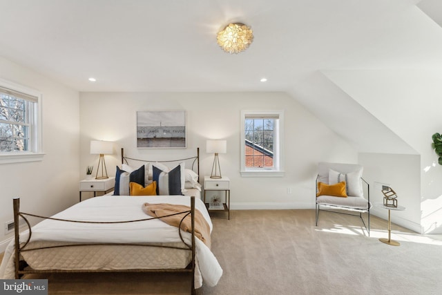 carpeted bedroom featuring vaulted ceiling