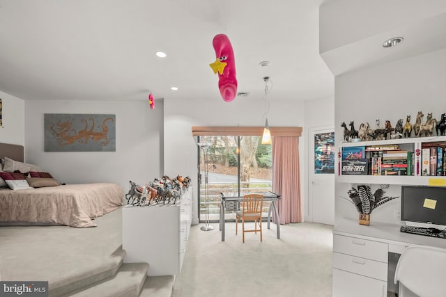 bedroom with light colored carpet