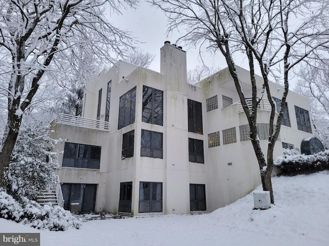 view of snow covered building