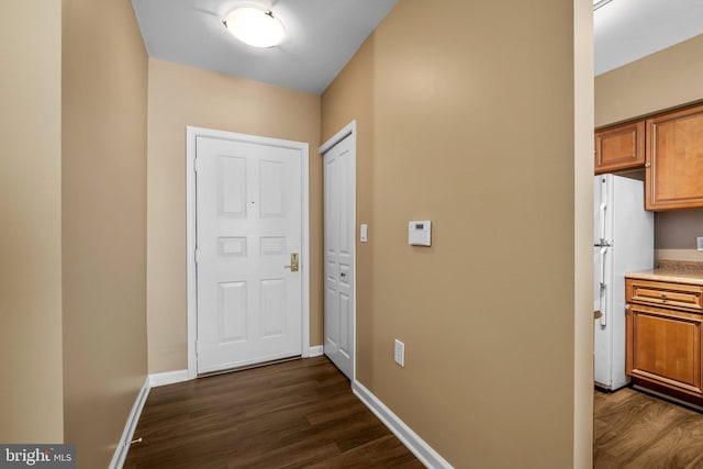 hall featuring dark hardwood / wood-style flooring