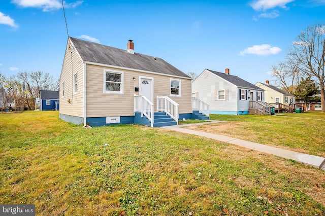 view of front of house with a front lawn