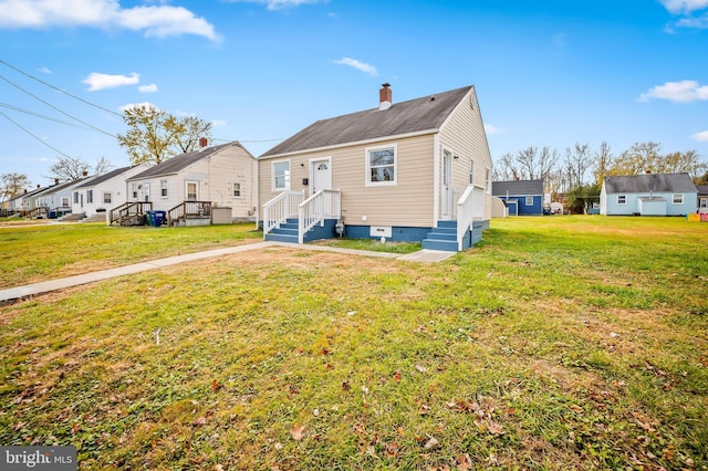 view of front of property featuring a front yard