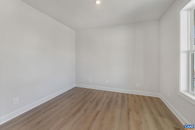 unfurnished room featuring light hardwood / wood-style flooring