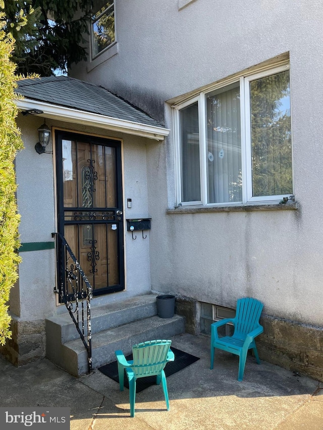 6701 Charles St, Philadelphia, PA 19135 - view of exterior entry featuring stucco siding