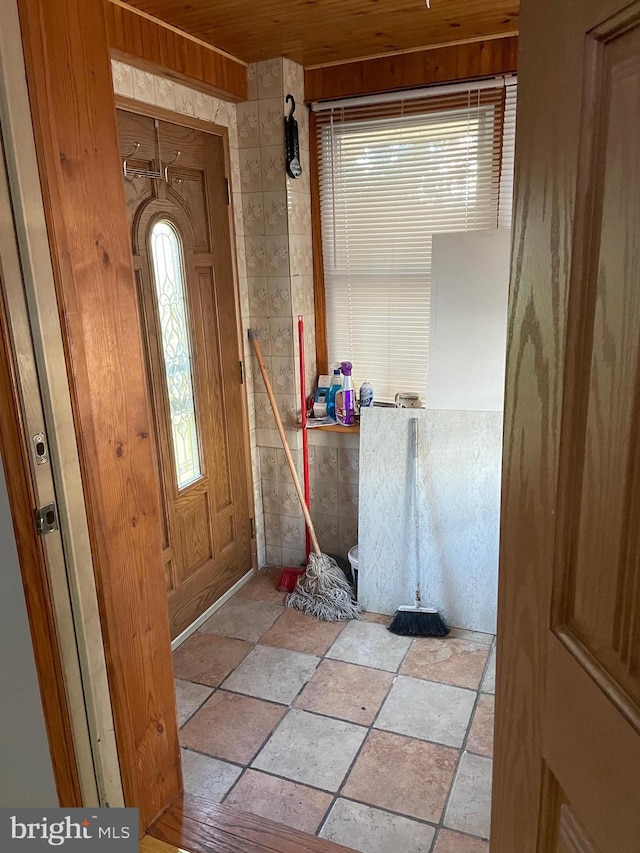 6701 Charles St, Philadelphia, PA 19135 - entryway with stone tile flooring and wooden ceiling