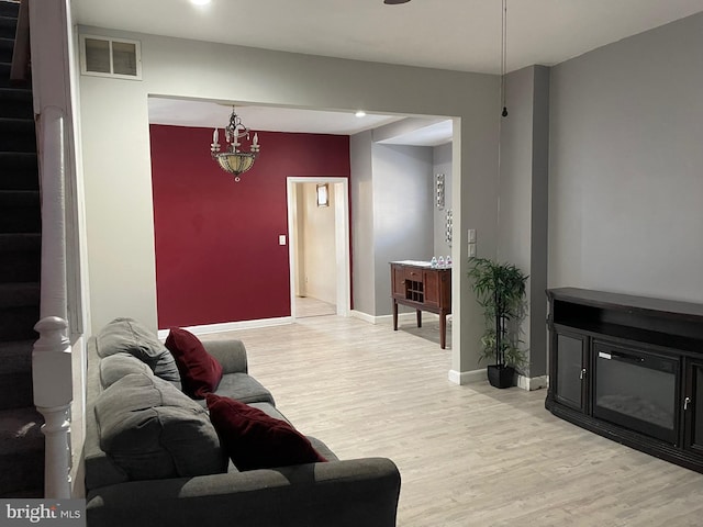 6701 Charles St, Philadelphia, PA 19135 - living area with light wood-type flooring and stairway