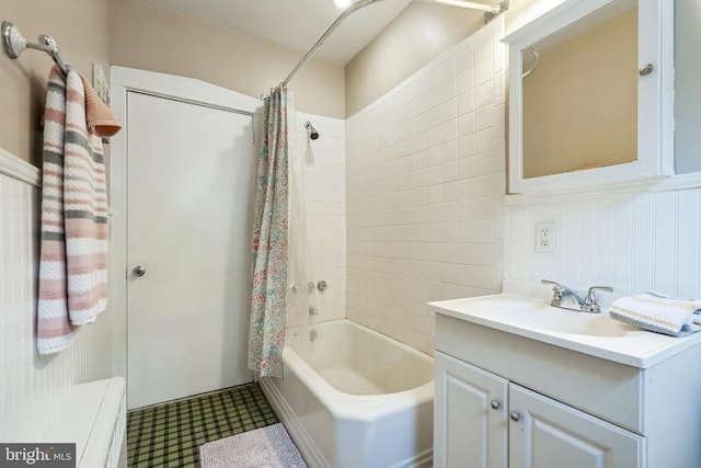 bathroom with vanity and shower / bathtub combination with curtain