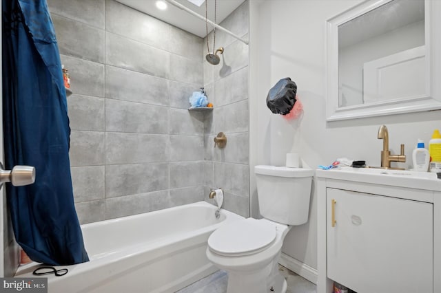 full bathroom with vanity, shower / bath combination with curtain, and toilet