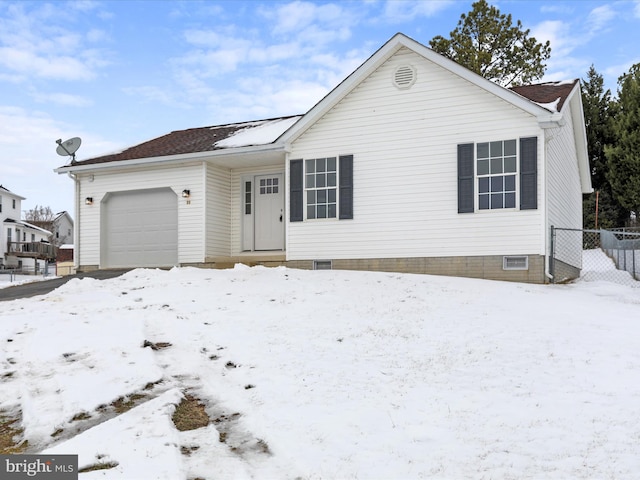 single story home featuring a garage