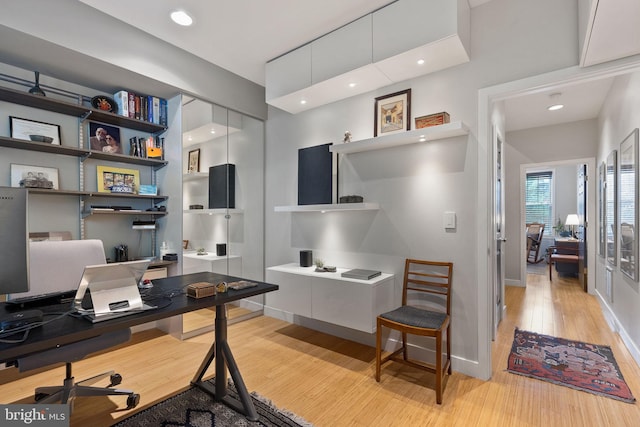 office space featuring light wood-type flooring