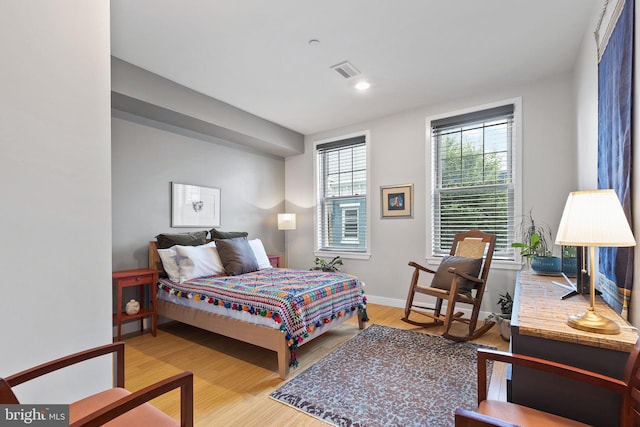 bedroom with wood-type flooring