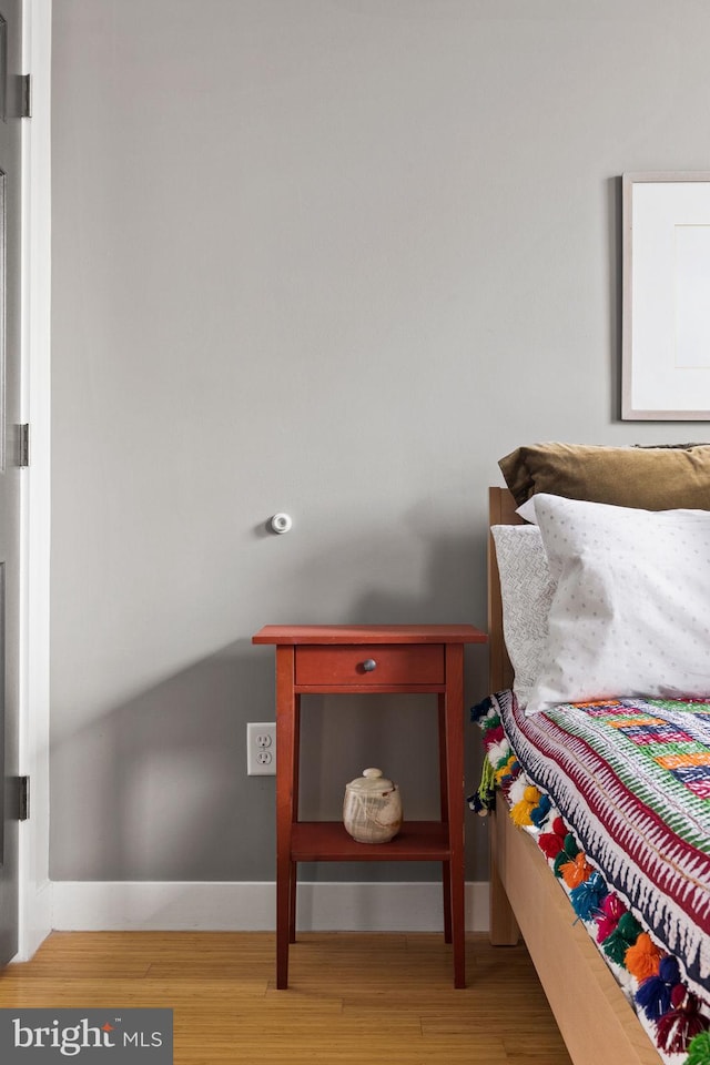 bedroom with light hardwood / wood-style flooring