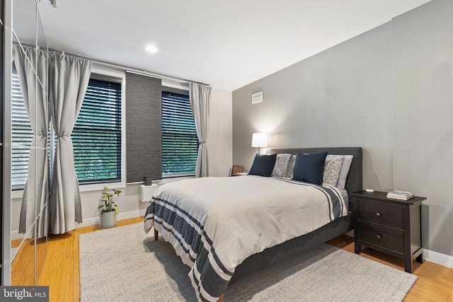 bedroom featuring light hardwood / wood-style flooring