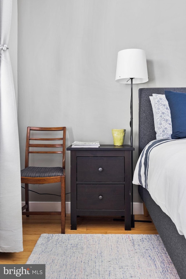 bedroom with light wood-type flooring