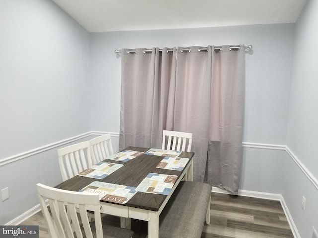 dining area featuring hardwood / wood-style flooring