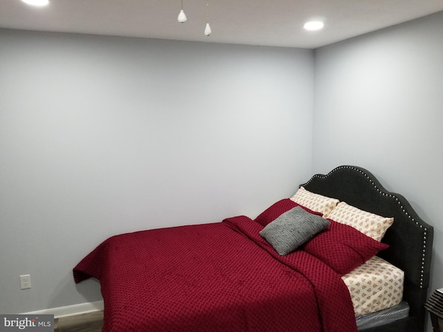 bedroom featuring hardwood / wood-style floors