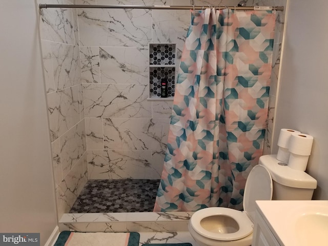 bathroom featuring a shower with curtain, tile patterned flooring, vanity, and toilet